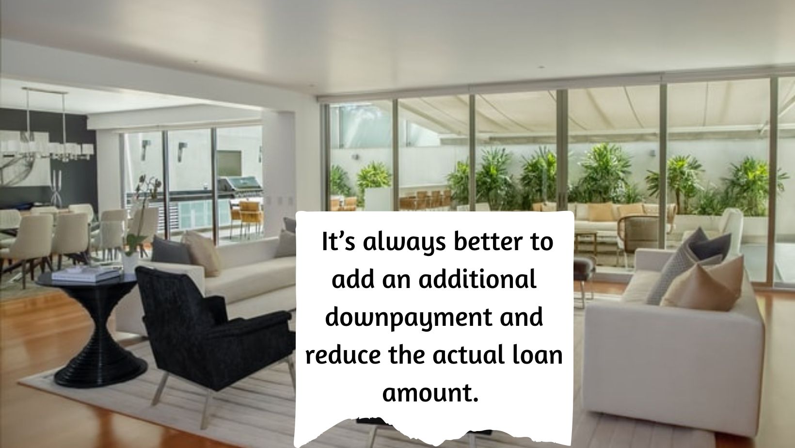 10 Essential Steps for First-Time Home Buyers: Your Ultimate Checklist 3 A modern living room with a quote advising an additional down payment to reduce loan amounts.