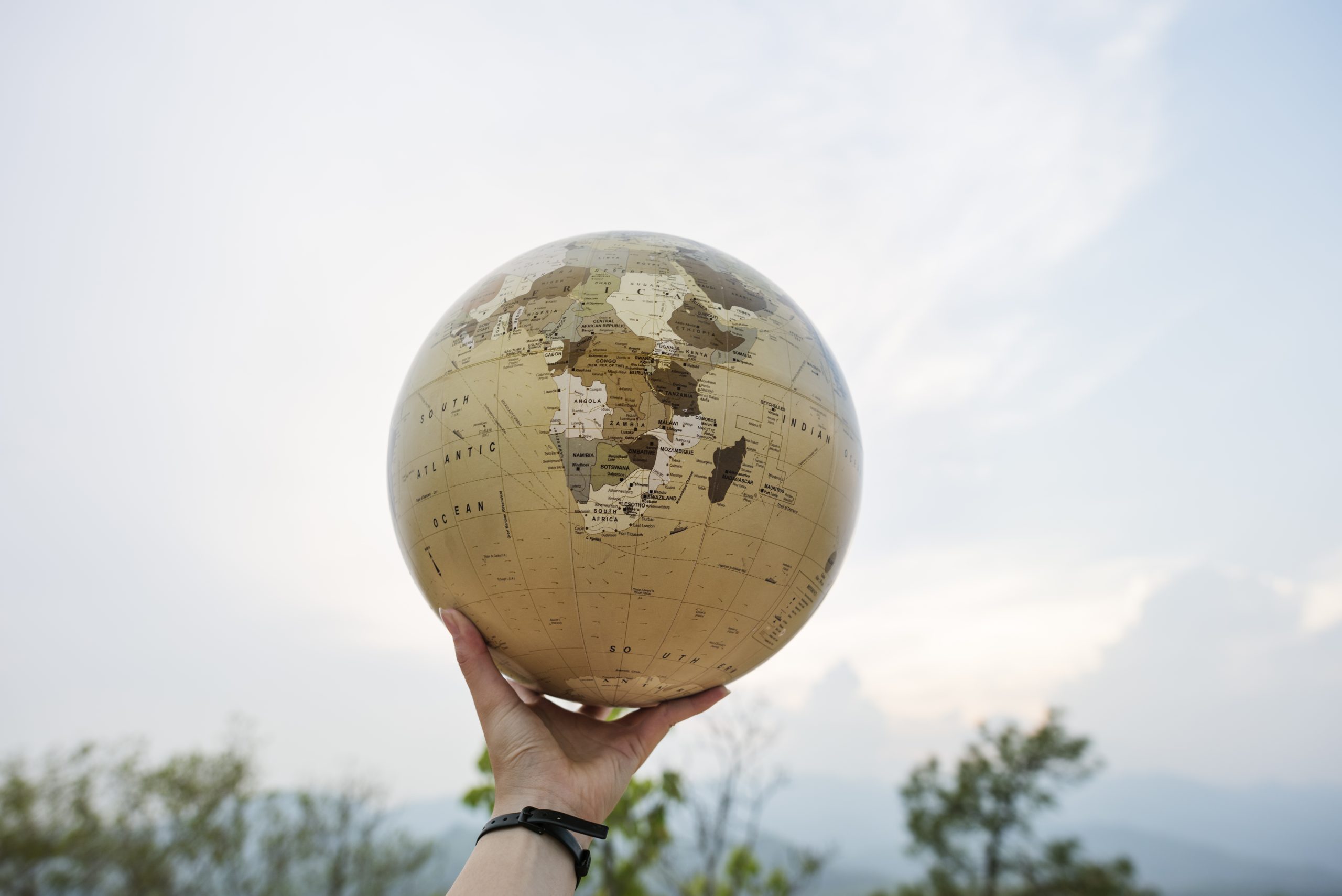 4 important factors to consider on LOCATION before buying your 3 BHK flat in Hyderabad 6 hand holding globe world location concept 2022 12 16 01 00 46 utc 1 scaled